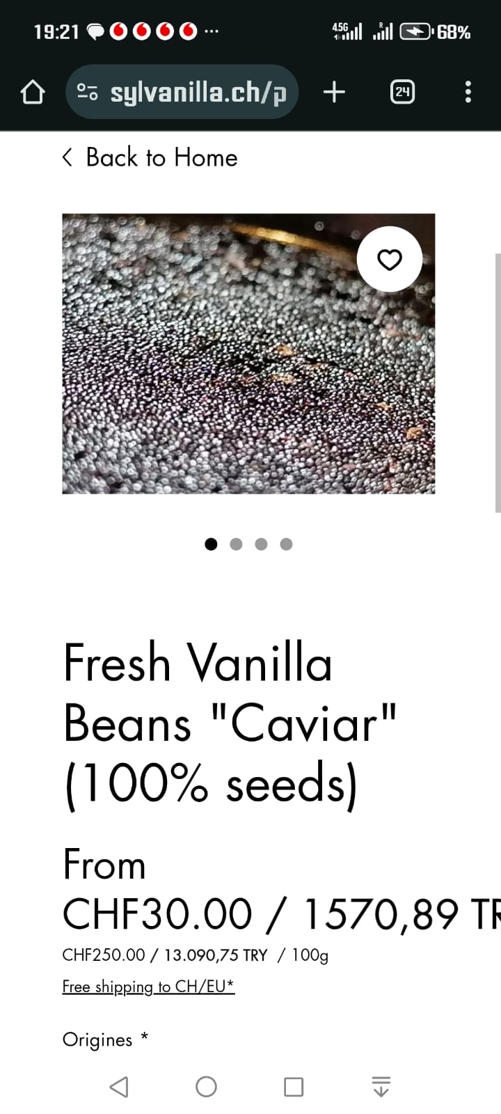 Scraping vanilla seeds with a spoon — from bean to recipe